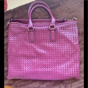 Purple leather bag.